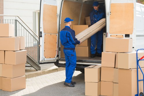 Man and van loading furniture for a Lewisham home move