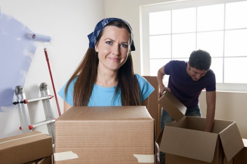 Professional movers handling a flat move in Lewisham with care