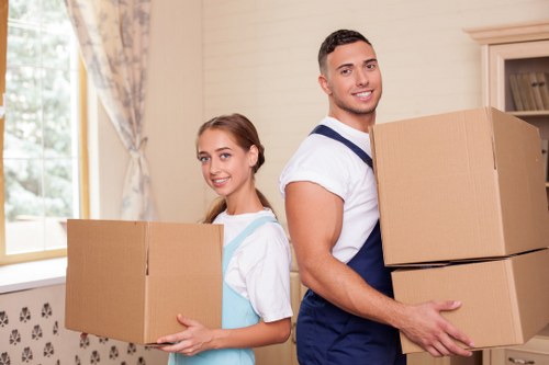 Local movers organising boxes for a property move in Lewisham