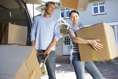 Moving van and packed boxes for a Lewisham apartment relocation
